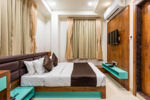 Et tv og/eller underholdning på The Grand Shaurya