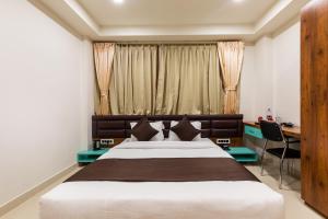 En eller flere senge i et værelse på The Grand Shaurya + 120 billeder