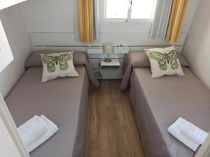 Posezení v ubytování Apartamento en edificio Stella Maris + 9 fotografií