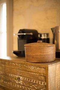 a wicker basket sitting on top of a counter at Nona Home Bordeaux in Bordeaux