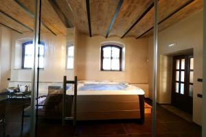 Borgo Degli Angeli Resort e Spa客房内的一张或多张床位