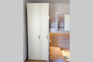 Ένα ή περισσότερα κρεβάτια σε δωμάτιο στο Casa Stefania