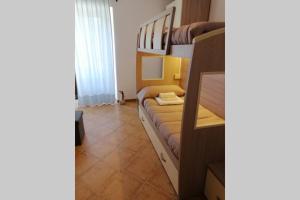 Ένα ή περισσότερα κρεβάτια σε δωμάτιο στο Casa Stefania