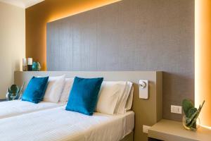 Voodi või voodid majutusasutuse Seawater Hotel Bio & Beauty Spa toas