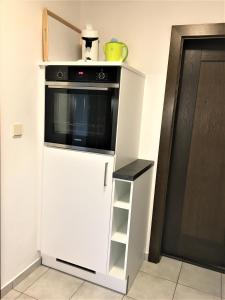Kuchyňa alebo kuchynka v ubytovaní Schans Appartements