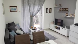 TV a/nebo společenská místnost v ubytování Apartman Ivan