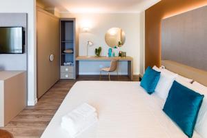 Voodi või voodid majutusasutuse Seawater Hotel Bio & Beauty Spa toas