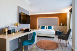 Voodi või voodid majutusasutuse Seawater Hotel Bio & Beauty Spa toas