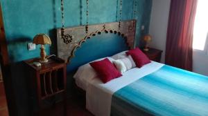 Tempat tidur dalam kamar di Casa Iria