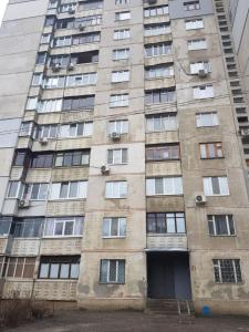 an old apartment building in a city at Стильные аппартаменты на Новых Домах in Kharkiv