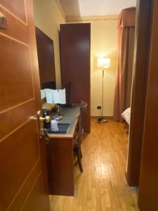 Postel nebo postele na pokoji v ubytování Hotel Hermitage