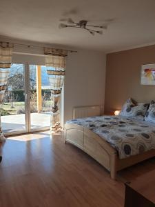 Postel nebo postele na pokoji v ubytování Ferienwohnung Albert Egger