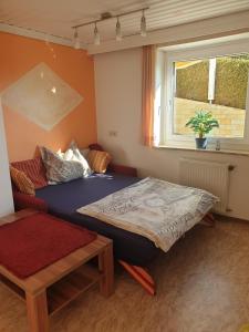 Postel nebo postele na pokoji v ubytování Ferienwohnung Albert Egger