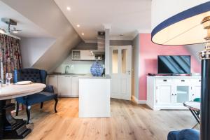 Kuchyň nebo kuchyňský kout v ubytování Hotel Norderriff