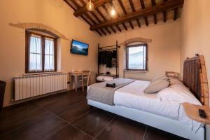 Borgo Degli Angeli Resort e Spa客房内的一张或多张床位
