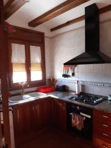 Kuchyň nebo kuchyňský kout v ubytování Casa Gargallo II