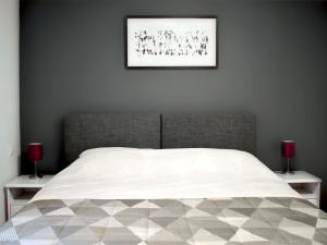 Postel nebo postele na pokoji v ubytování B&B Le Clos du Lac