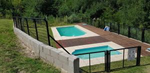 A view of the pool at Altos del Lago or nearby