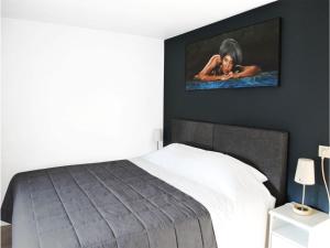 Postel nebo postele na pokoji v ubytování B&B Le Clos du Lac