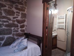 Posteľ alebo postele v izbe v ubytovaní casa rural La Fragua