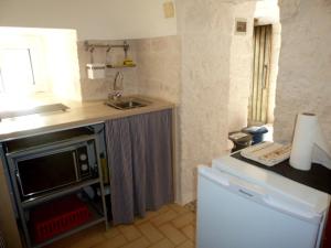 Una cocina o cocineta en Il Piccolo Trullo