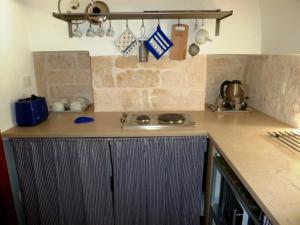 Una cocina o cocineta en Il Piccolo Trullo