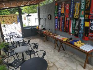 a restaurant with tables and chairs in a room at Antheia Ponta do Seixas in João Pessoa