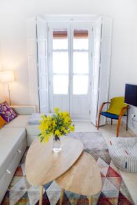 Posedenie v ubytovaní Hispalis Casa Palacio Apartment