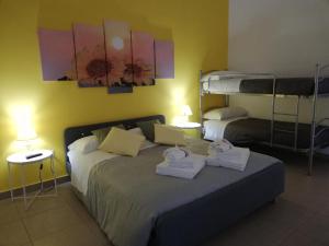 Postel nebo postele na pokoji v ubytování B&b Passione del sud