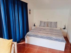 Postel nebo postele na pokoji v ubytování Apartments Barbaresko