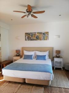 Ένα ή περισσότερα κρεβάτια σε δωμάτιο στο Monte das Perdizes