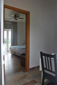 Postel nebo postele na pokoji v ubytování Monte das Perdizes