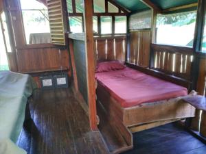 Łóżko lub łóżka w pokoju w obiekcie Casa Pequeña