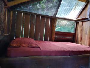 Łóżko lub łóżka w pokoju w obiekcie Casa Pequeña