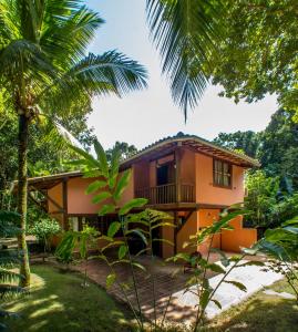 a house in the middle of a forest at Espaço Pégasus in Trancoso