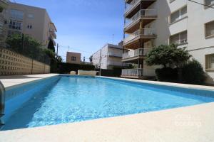 The swimming pool at or close to InmoBooking LeriMar