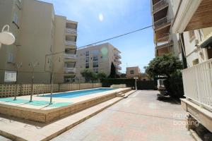 The swimming pool at or close to InmoBooking LeriMar