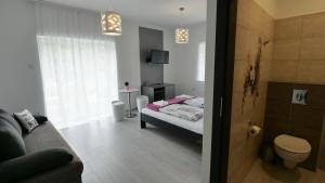 Posteľ alebo postele v izbe v ubytovaní Anna Villa Füred Boutique Rooms + 37 fotografií