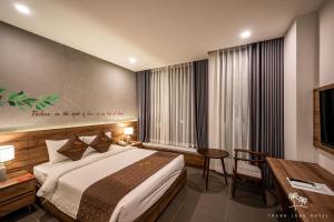 Säng eller sängar i ett rum på Thanh Long Hotel - Tra Khuc