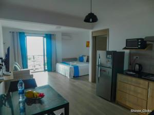 Η κουζίνα ή μικρή κουζίνα στο Fullmoon Apartment & Studio