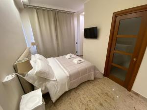 Postel nebo postele na pokoji v ubytování B&B San Michele Foggia