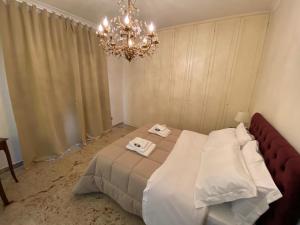 Postel nebo postele na pokoji v ubytování B&B San Michele Foggia