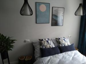 Posteľ alebo postele v izbe v ubytovaní Apartament Skrytka