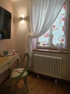 TV a/nebo společenská místnost v ubytování 1848 Chef's Rooms
