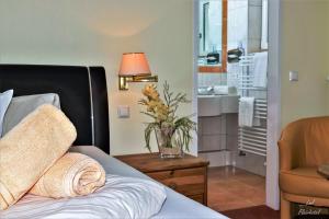 Kuchyňa alebo kuchynka v ubytovaní Flairhotel am Wörthersee