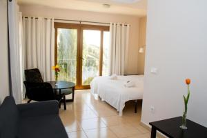 Postel nebo postele na pokoji v ubytování Hostal Gran Sol