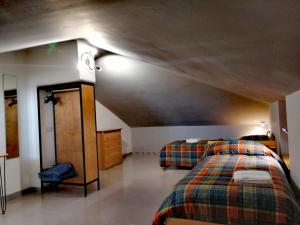 Postel nebo postele na pokoji v ubytování Kalispéra B&B