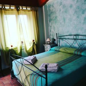 Postel nebo postele na pokoji v ubytování B&B SABRINA