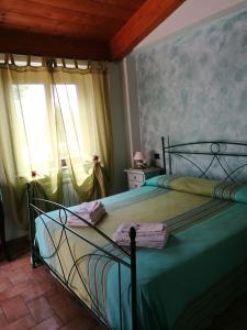 Postel nebo postele na pokoji v ubytování B&B SABRINA
