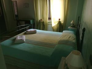 Postel nebo postele na pokoji v ubytování B&B SABRINA